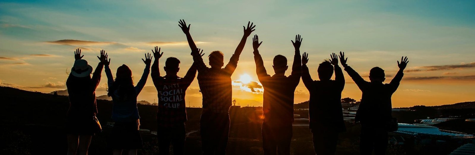 people silhouette during sunset