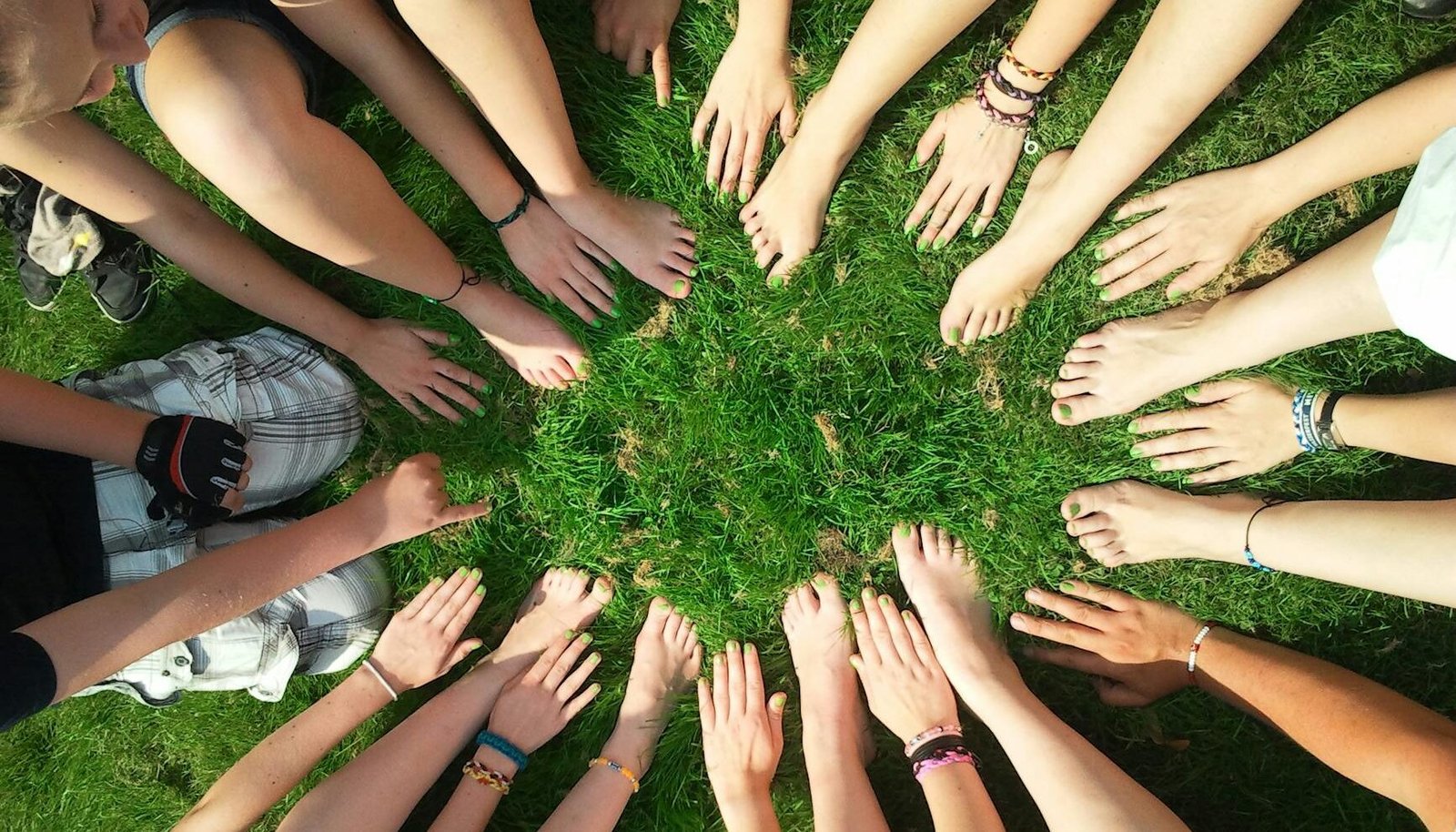 person gather hand and foot in center