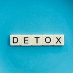 detox text on round blue plate